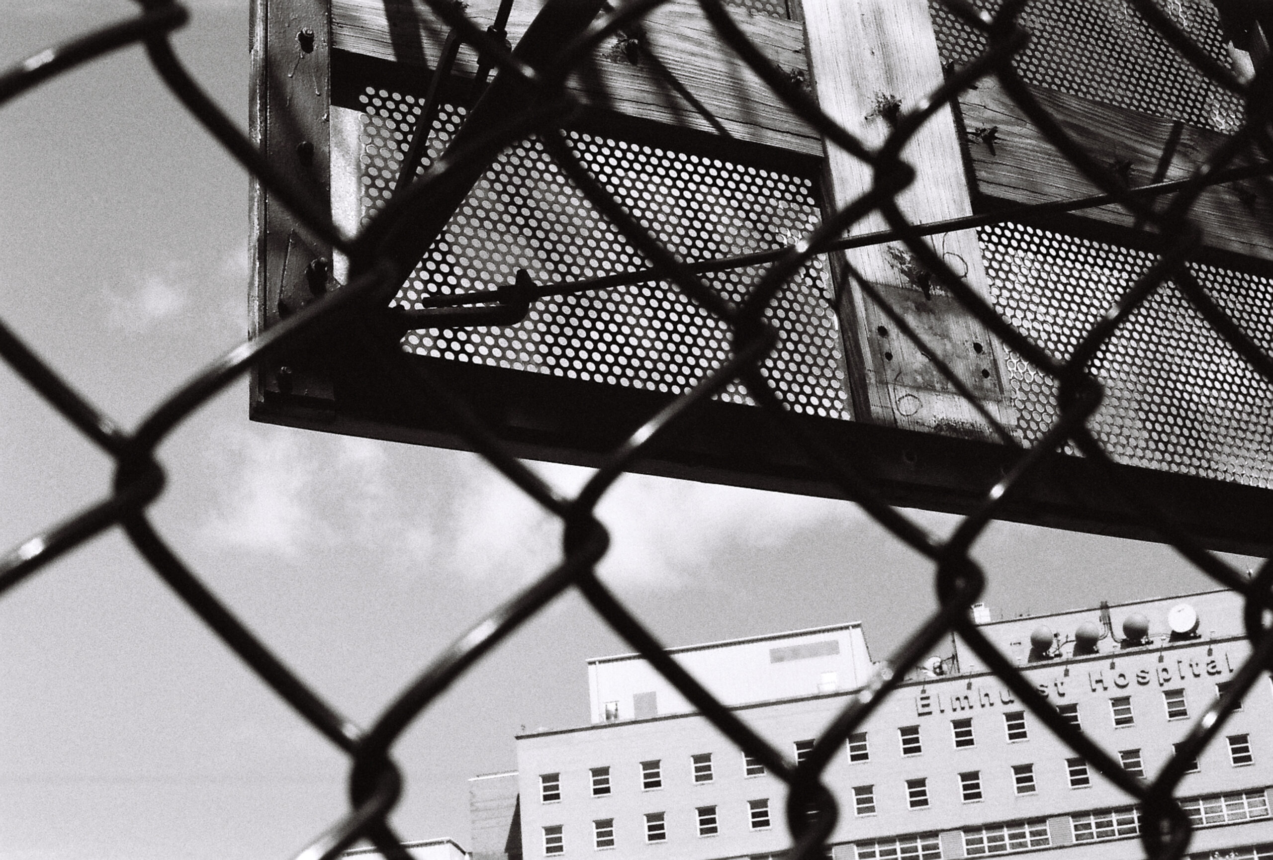 Photo of basketball hoop with rim removed during covid by Raul Barquet